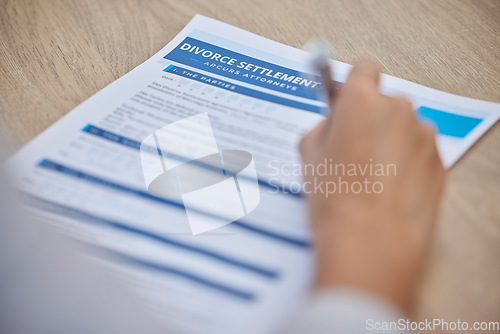 Image of Divorce paperwork, woman hands and signature for agreement, contract and legal documents on desk. Family law, sign and person writing on print paper for notary, break up and marriage policy rules