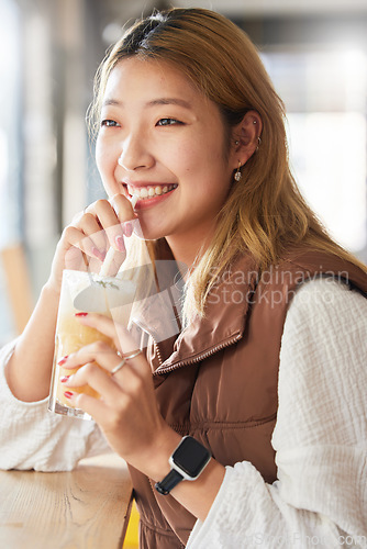 Image of Health, Asian woman and smoothie for diet, in a cafe and happiness for wellness and thinking. Japan, female and happy girl with milkshake, relax break and cheerful daydreaming by a restaurant window
