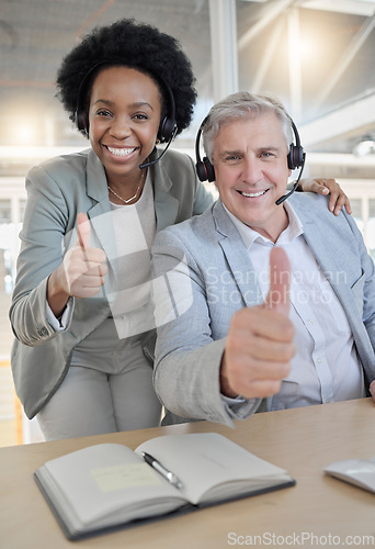 Image of Customer support, thumbs up and portrait of black woman and man happy at desk in office. Contact us, help desk and teamwork with smile and notebook at advisory agency for crm training at call center.