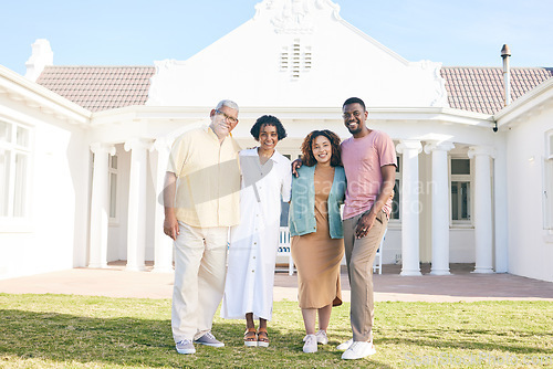 Image of Happy, parents and couple standing by a new home with pride, smile and happiness together. Care, bonding and interracial elderly man and woman with their adult children by a house, property or estate