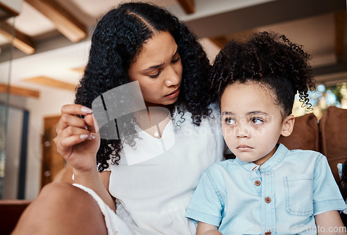 Image of Comfort, support and mother with crying child sitting on floor in living room and talking after tantrum. Anxiety, security and trust, woman comforting sad boy with love and safety from mom at home.