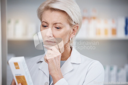 Image of Pharmacist, pharmacy and woman reading medicine label, pills or box in drugstore. Healthcare, thinking and elderly medical doctor looking at medication, antibiotics or drugs, vitamins or supplements.