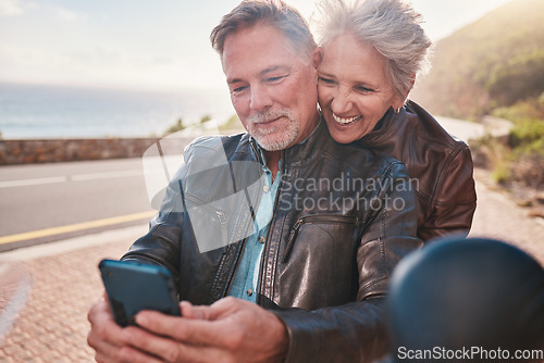 Image of Selfie, biker couple and road trip, smile and laughing, love and romance on vacation outdoors. Travel, retirement and senior man and woman traveling on motorbike to take pictures for happy memory.