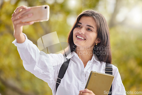Image of Student, woman and happy for selfie at college, outdoor and smile for social network ui, web or excited in summer. Young gen z girl, influencer or profile picture at university for mobile photography