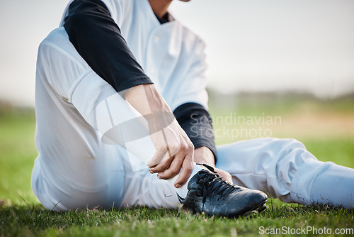 Image of Baseball player, shoes and ankle pain, man with sport injury and emergency, first aid and need medical care outdoor. Accident, muscle tension and inflammation with male on sports field and fitness