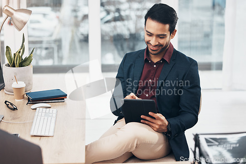 Image of Corporate asian man, tablet and reading in office for email communication, schedule or planning. Entrepreneur, businessman or focus by touch screen for web design, writing and agenda on digital app