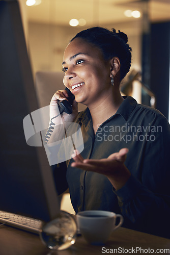 Image of Overtime, night and businesswoman telephone call in an office working late evening in communication at the workplace. Young, computer and professional corporate employee or worker talking