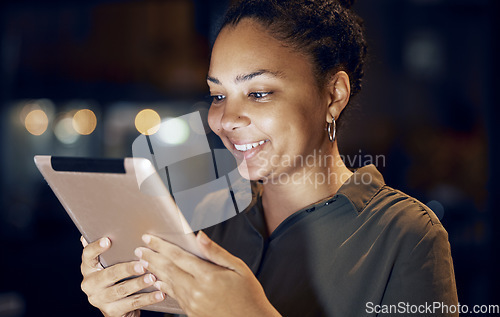 Image of Tablet, night and business woman reading online data analysis, feedback report or customer experience insight. Brand monitoring software, social media research and African worker review web analytics