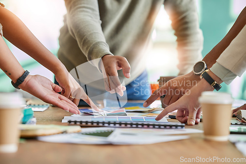 Image of Color, creative palette and hands of business people on desk for branding meeting, strategy and marketing design. Teamwork, collaboration and designers brainstorming ideas, thinking and planning