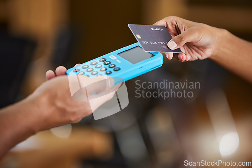 Image of Hands, credit card and machine for ecommerce, payment or wireless transaction and purchase at retail store. Hand of customer paying, buying or tap to pay on electronic POS device for easy banking