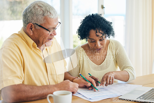 Image of Paperwork, budget and senior couple at home for retirement funds, investment planning or asset management together. Elderly people or woman and partner reading documents, financial loan or mortgage