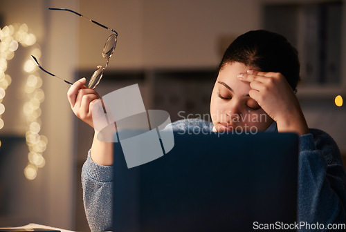 Image of Mental health, laptop and night woman with burnout from university research, college project or essay. Education learning, school study or philosophy student with headache, stress or crisis problem