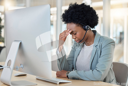 Image of Call center, telemarketing and black woman with headache, stress and burnout in workplace. Female employee, consultant and agent with migraine, depression and tech support in office and frustrated