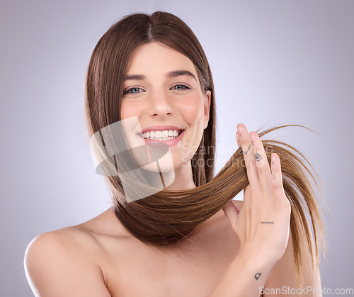 Image of Face portrait, beauty and hair care of a woman in studio isolated on a background. Makeup cosmetics, growth and happy smile of female model with salon treatment for healthy keratin or long hairstyle.
