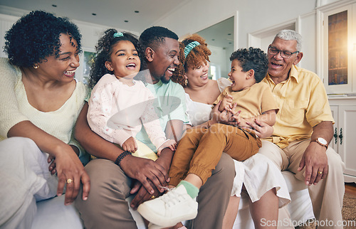 Image of Black family laughing, portrait and living room sofa of a mother, father and children with grandparent. Happy, smile and bonding of a mom, dad and young kids together having fun with love and support