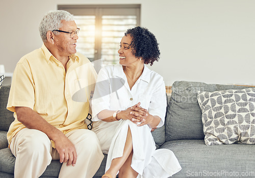 Image of Love, talking and senior couple on couch, quality time and happiness on break, affection and retirement. Romance, old man and mature woman on sofa, romance and conversation in living room and joyful