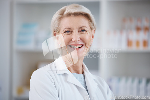 Image of Pharmacy, pharmacist portrait and smile of woman in drugstore or medicine shop. Healthcare, wellness face and happy, proud and confident senior medical professional from Canada laughing for career.