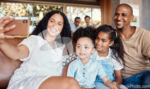 Image of Family, relax and selfie smile in home, having fun and bonding together. Interracial, photography and father, mother and girls taking pictures or photo for social media and happy memory in house.