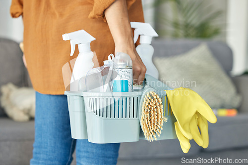 Image of Woman, hand or cleaning bucket of housekeeping product, hotel maintenance or home healthcare wellness. Zoom, cleaner or maid worker with container, spray bottle or scrub brush for hospitality service