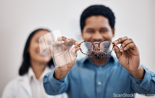 Image of Medical, eye care and vision with black man and glasses for you for decision, retail and optometry. Choice, frames and ophthalmology with doctor and patient for consulting, shopping and healthcare