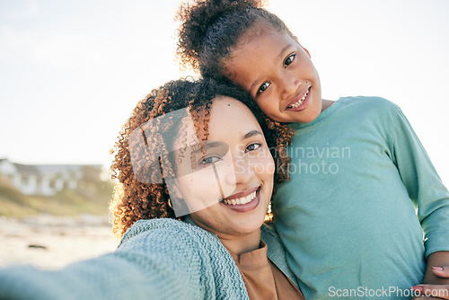 Image of Selfie, smile and portrait of mother and girl by beach for bonding, relax and hug for quality time together. Summer, happy family and mom and child take picture by sea on holiday, vacation or weekend