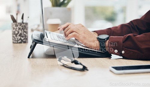 Image of Business man, hands and typing on laptop, information technology and tech support and working in office. Keyboard, glitch or 404 with software update, male at desk with digital problem solving