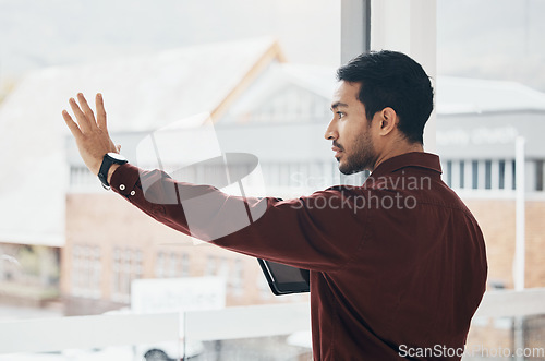 Image of Invisible screen, window and business man in office with hand gesture for hologram, virtual tech and ai. Network, technology mockup and serious male with tablet for internet, research and online ux