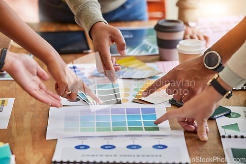 Image of Color design, creative and hands of business people point on desk for branding meeting, strategy and marketing. Teamwork, collaboration and designers brainstorming logo ideas, thinking and planning