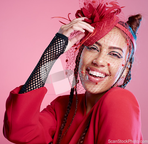 Image of Punk, rock and smile portrait of a young woman with creative designer, fashion and edgy clothing. Isolated, pink background and gen z latino model beauty with cool, rocker and funky style in a studio