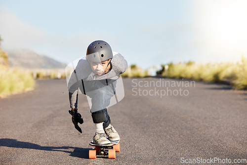 Image of Skateboard, sports and mountain with man in road and travel for speed, freedom and summer break. Motion, adventure and fitness with guy skating fast in street for training, gen z or balance in nature