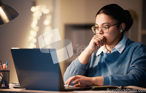 Image of Business woman, laptop and thinking in home at night, working on project or research. Idea, reading or female professional, freelancer or remote worker on computer planning, contemplating or decision