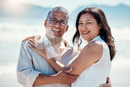 Image of Love, beach and portrait old couple in embrace, smile on face and romance in happy relationship. Romantic retirement vacation, senior woman and mature man hugging on tropical ocean holiday travel.