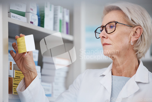 Image of Pharmacist, pharmacy and woman reading side effects on medication label, pills or box in drugstore. Healthcare, wellness and medical doctor looking at medicine, antibiotics or drugs or vitamins