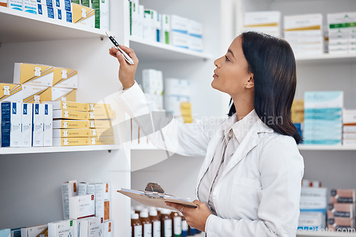 Image of Pharmacy inventory check, Indian woman and checklist of medicine and pills. Pharmacist, stock work and pharmaceutical products in a retail shop or clinic with healthcare and wellness employee