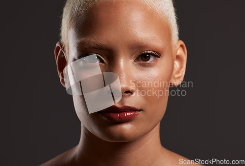 Image of Beauty, makeup and zoom, face of black woman in dark studio with platinum hair isolated on grey background. Art aesthetic, cosmetics and portrait of African model in skin glow and luxury spa facial.