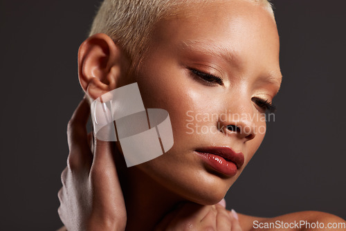 Image of Beauty, makeup and face of black woman in dark studio with platinum hair isolated on grey background. Art aesthetic, cosmetics and beautiful African model with skincare, luxury spa facial and zoom.
