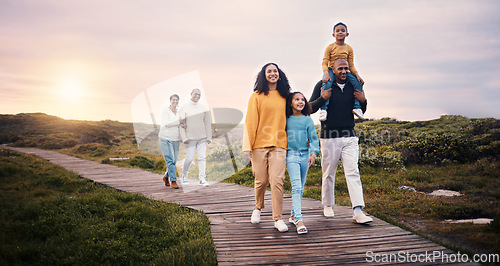 Image of Black family, walking or sunset with parents, children and grandparents spending time together in nature. Spring, love or environment with kids and senior relatives taking a walk while bonding