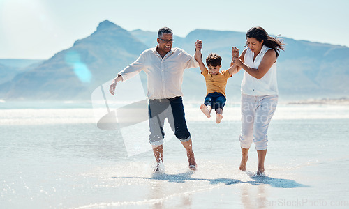 Image of Family, beach and grandparents with child for playing, quality time and adventure together. Travel, happy and grandfather, grandma and boy bonding on summer holiday, fun vacation and relax on weekend