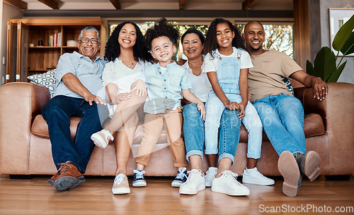 Image of Black family portrait, living room sofa and bonding of a mother, father and kids on a couch with happiness. Happy, parent love and grandparent support of people laughing in a home together with smile