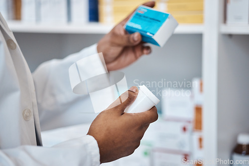 Image of Pharmacy stock check, black man hands and supplements ingredients of medicine and pills. Pharmacist, work and pharmaceutical products in a retail shop or clinic with healthcare and wellness employee