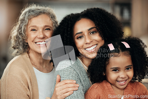 Image of Children, parents and grandparents with the portrait of a black family bonding together in their home. Kids, love or relatives with a woman, senior grandmother and girl posing in the living room