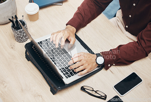 Image of Business man, hands and laptop on desk, information technology and tech support top and working in office. Typing, glitch or 404 with software update, keyboard and male with digital problem solving