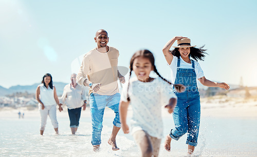 Image of Family, beach and parents running with girl in water for bonding, quality time and adventure together. Travel, happy and mom, dad and grandparents with child enjoy summer holiday, vacation and relax