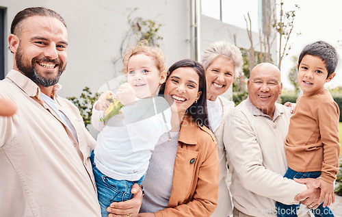 Image of Selfie, family or love with parents, kids and grandparents posing for a picture outdoor in the home backyard. Photograph, social media or bonding with a man outside with senior relatives and children