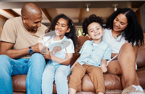 Image of Black family, living room portrait and laughing of a mother, father and kids on a couch with happiness. Happy, parent love and support of girl on in a home sofa together with a smile in a house