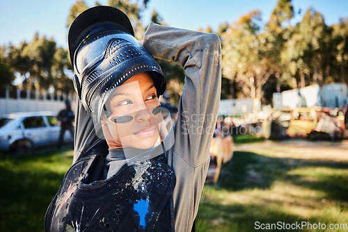 Image of Paintball, girl or woman stretching in training or game playing on battlefield or playground to warm up. Fitness or flexible female soldier with army gear in survival military challenge competition