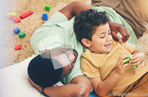 Image of Relax, father and boy on floor with toys for playing, creative activity and fun bonding in living room. Education, child development and kid enjoy building blocks, games and relax with dad at home