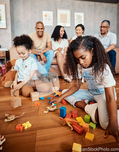 Image of Family, happy and children playing with blocks for education, learning and curiosity. Living room, playful and kids with toys for mental development, childhood and hobby with parents and grandparents