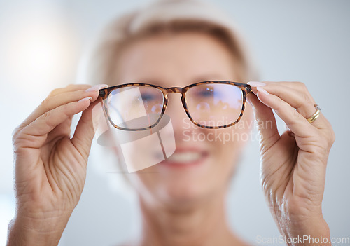 Image of Optometry, vision and senior woman with glasses for eye care, health and wellness in clinic. Healthcare, ophthalmology and portrait of elderly female with spectacles prescription lens in optic store.