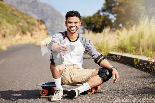 Image of Young man outdoor, skateboard and skater with fitness on country road with smile in portrait and extreme sport. Happiness, exercise and skating, gen z male and hobby with training and sports